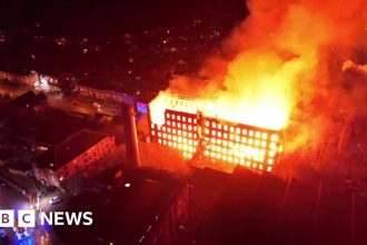 Arrest after major fire tears through historic mill