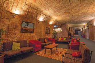 An underground world: The Australian town where life exists beneath the ground, with churches and hotels under the desert
