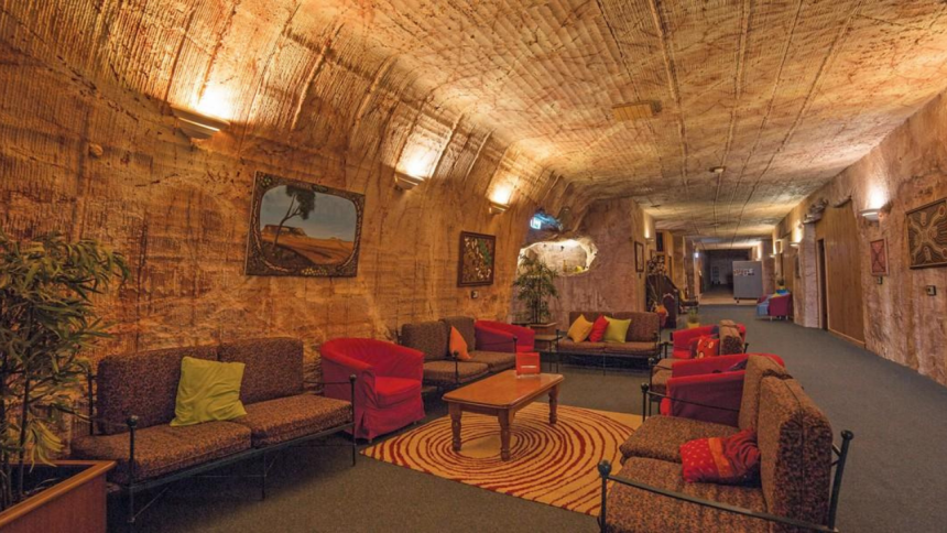 An underground world: The Australian town where life exists beneath the ground, with churches and hotels under the desert