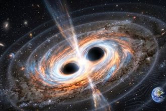 Two giant black holes are set to collide in the next 100 years, and Earth could feel the shockwaves