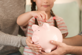Building smart money habits early: 4 ways parents can encourage goal-setting and patience in children