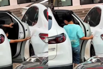 Child opens car door carefully to avoid scratches, a simple moment that reveals powerful parenting