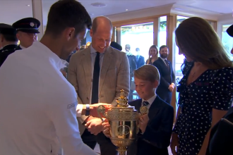 ‘Don't drop it,’ said Prince William as Novak Djokovic handed the 2022 Wimbledon trophy to Prince George