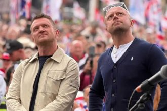 Dozens arrested at Tommy Robinson march in London; Elon Musk calls Britain ‘prison island’