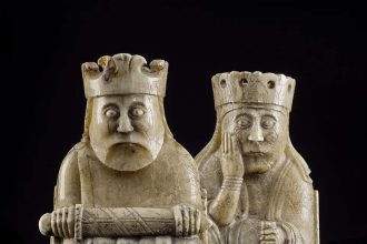 In 1831, a man digging in a Scottish sand dune found a "frozen" crowd of ivory faces that changed history