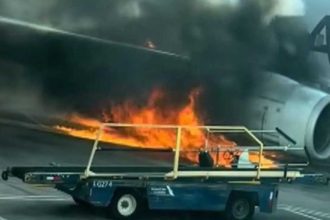 Plane with 231 flyers runs over jaywalker, engine catches fire