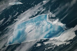 The great white giant turns blue: The final act of Iceberg A-23A