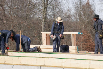 Unsung heroes: Amish volunteers rebuild dozens of homes and bridges for free after Hurricane Helene in North Carolina