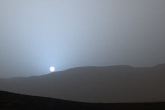 Why do sunsets on Mars glow blue despite the planet being red