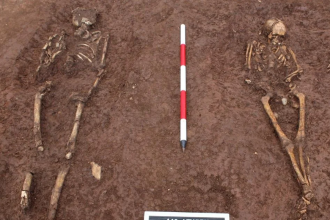 Workers expanding a highway suddenly uncovered graves, a Roman well, and an anglo-saxon house hidden for 8000 years