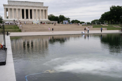 America@250 swathed in red, white, and blue — and green algae