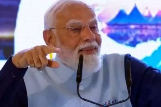As he achieves record, PM vows faster reforms