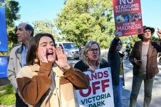 'Excavators and bulldozers': Brisbane kicks off $2.6bn Olympic stadium project amid protests