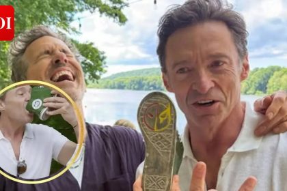 Hugh Jackman introduces Ryan Reynolds to a 'shoey', but fans spot a detail that sparks 'fake' tradition claims: 'That's Un-Au