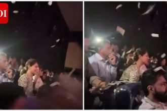'Peddi' theatre celebrations: Upasana Kamineni enjoys Ram Charan film with fans; Showers confetti inside Hyderabad theatre
