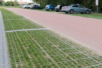 Dutch cities are replacing solid concrete surfaces with grass-filled paving blocks that absorb rainwater and help keep urban