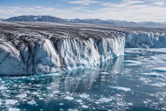Greenland lost 105 billion tonnes of ice as darkening surface speeds melting