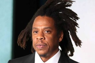 Jay-Z seeks to recover $119K from godmother of man who claims to be his son