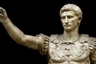 Quote of the day by Augustus: 'We write our names in the sand and then the waves roll in and...'