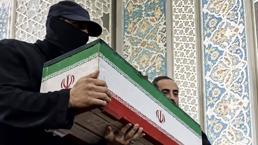 'Who was the masked man?' Khamenei funeral mystery solved